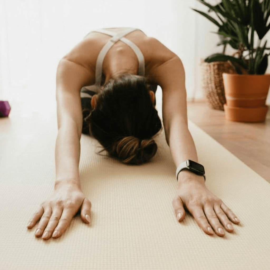 women stretching her back - back pain Pilates Dublin | Aoife Moves